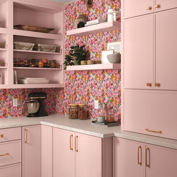 A closer look at pink painted cabinetry in a butler's pantry